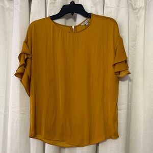 Naked Zebra Golden Ruffle Sleeve Blouse